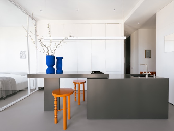 A modern kitchen features a minimalist design.