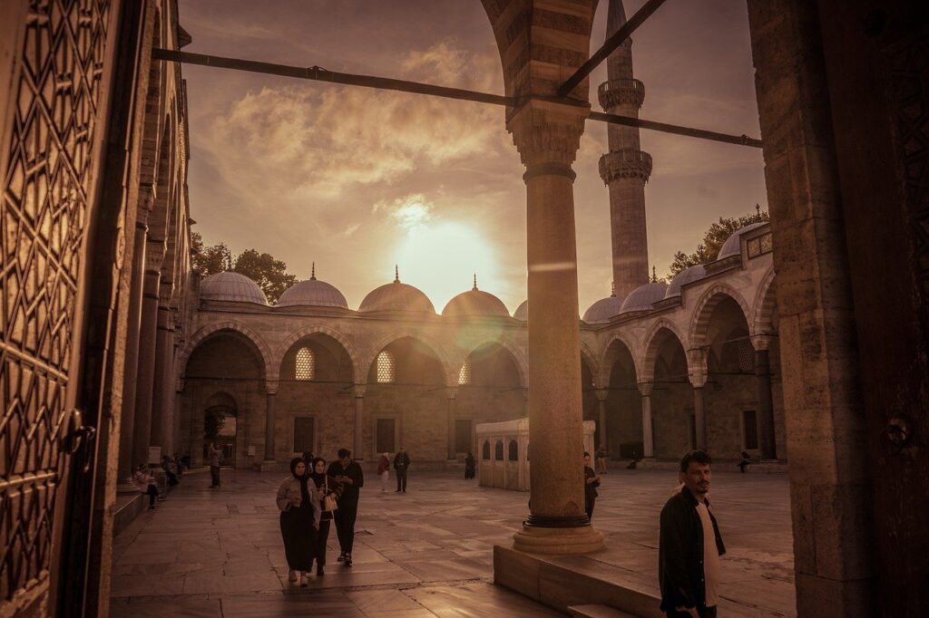 istanbul, turkey, mosque courtyard, islamic architecture, ottoman architecture, suleymaniye mosque, sunset, courtyard, arches, people, travel, culture, religion, heritage, nature, historical building, tourism