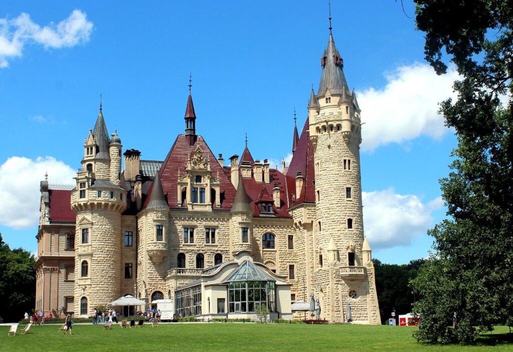 castle, architecture, moszna castle, poland, landmark, building, tourism, history, neo-gothic, romanticism, towers, windows, light blue, greenery, outdoor, summer, romantic castle, exterior, grass, landscape